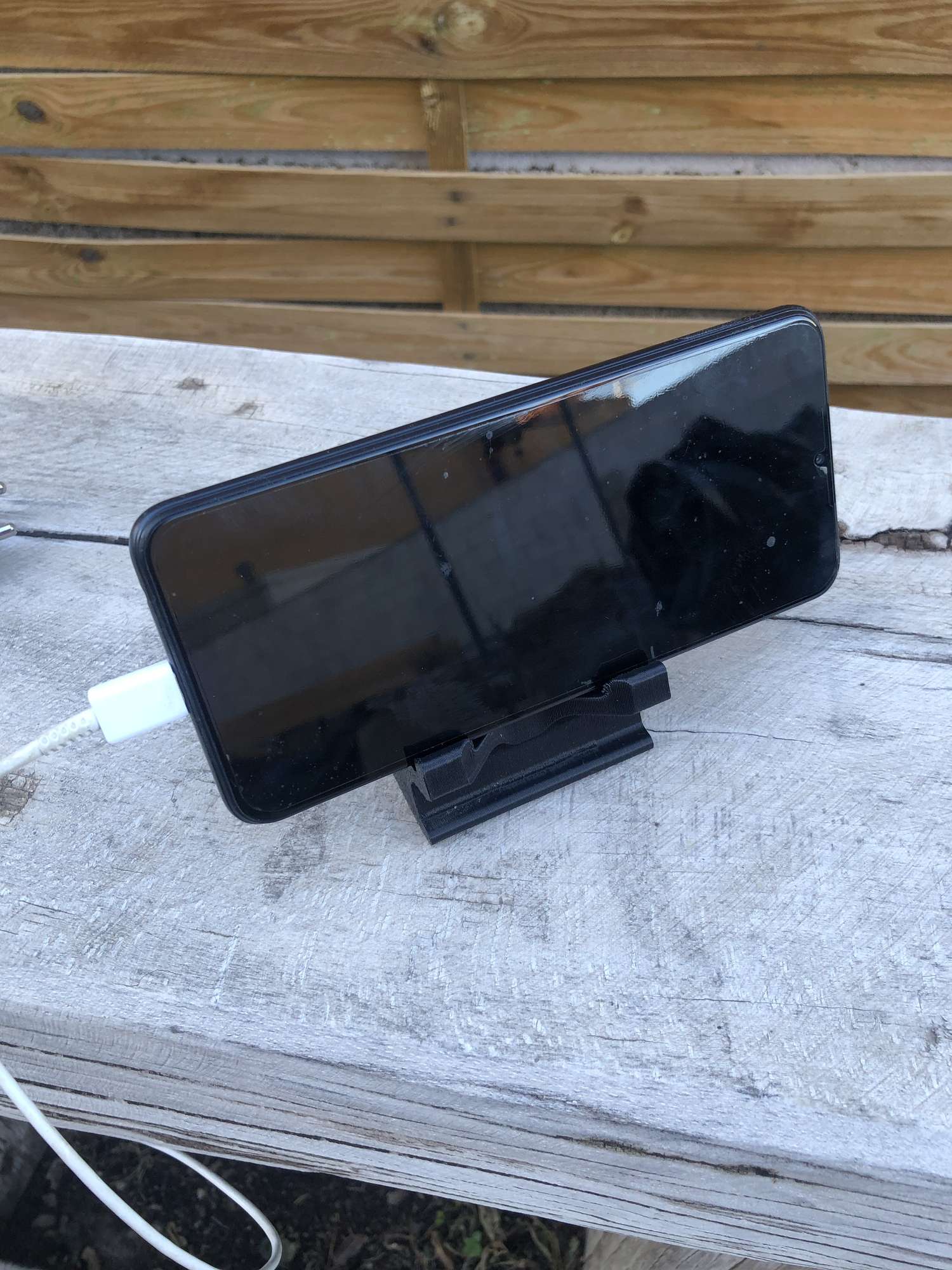 mobile_device_stand_with_cable_pass_through_3D_printed_with_phone mobile_device_stand_with_cable_pass_through_3D_printed_with_phone